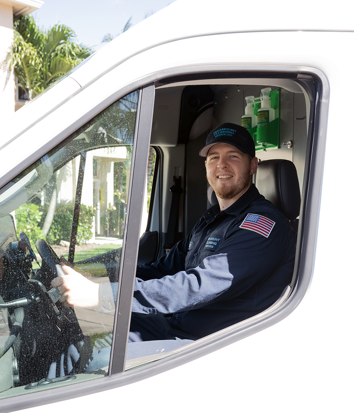 professional plumber in paramount plumbing services van