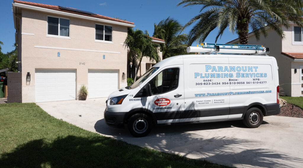 Paramount plumbing services van at residential home