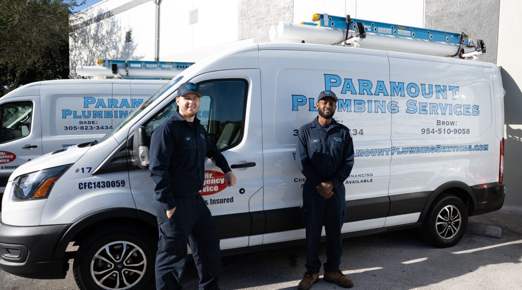Paramount plumbers in front of work van