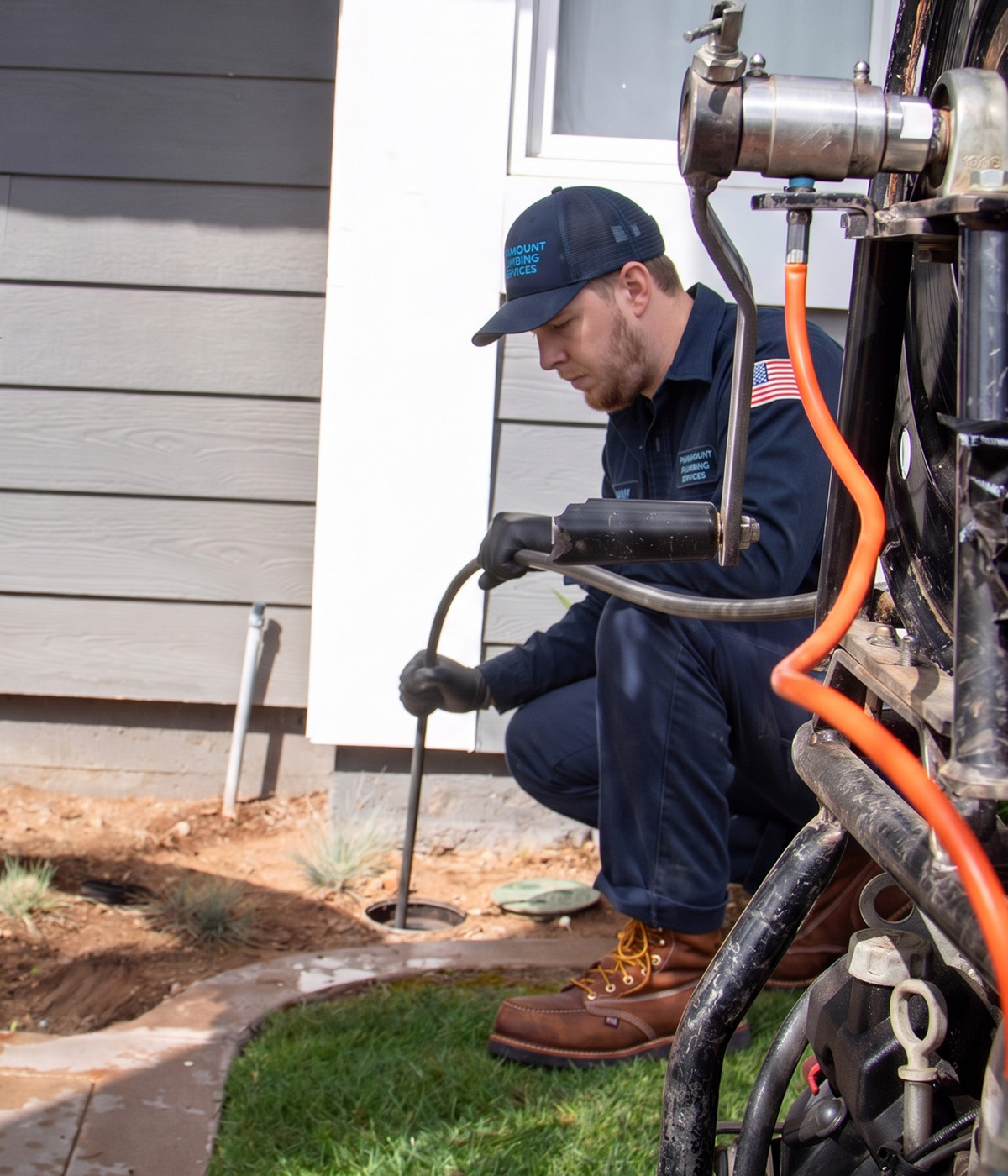Paramount Plumbing Services technician performing hydro jetting drain cleaning at a home in Pembroke Pines, FL